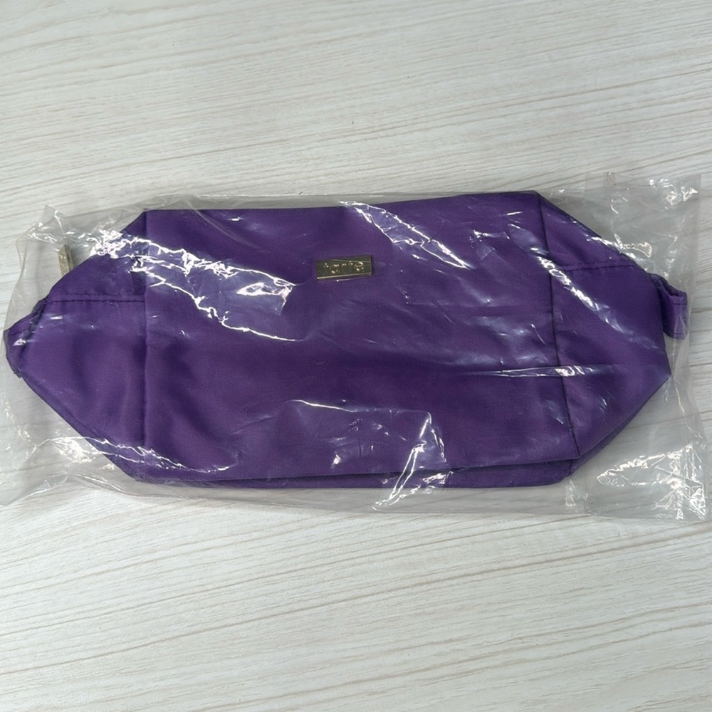 Tarte cosmetics purple cosmetic bag, New in sealed bag
